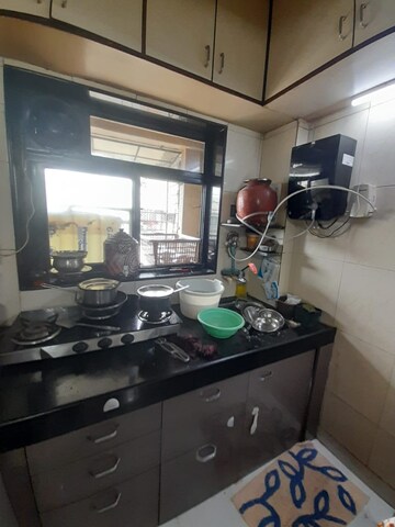 Team Area in 1 BHK Apartment at Divya Srushti CHS, Kandivali West – for Rent