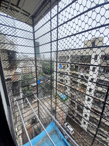 Balcony in 1 BHK Apartment at Divya Srushti CHS, Kandivali West – for Rent