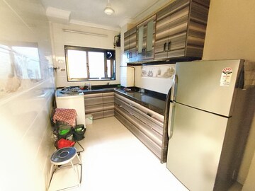 Kitchen in 2 BHK Apartment at Seven Bungalow, Andheri West – for Rent