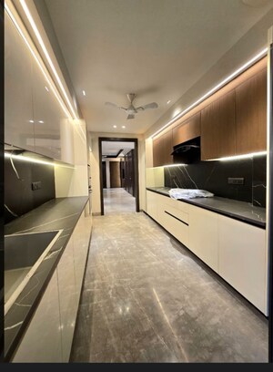 Kitchen in 4 BHK Builder Floor at Panchsheel Enclave – for Sale