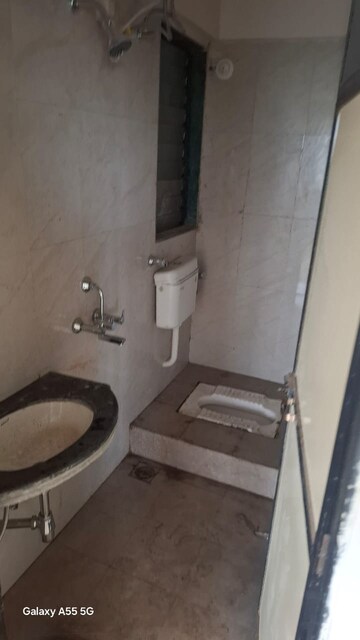 Bathroom in 2 BHK Apartment at Patrachawl Mhada, Goregaon West – for Rent