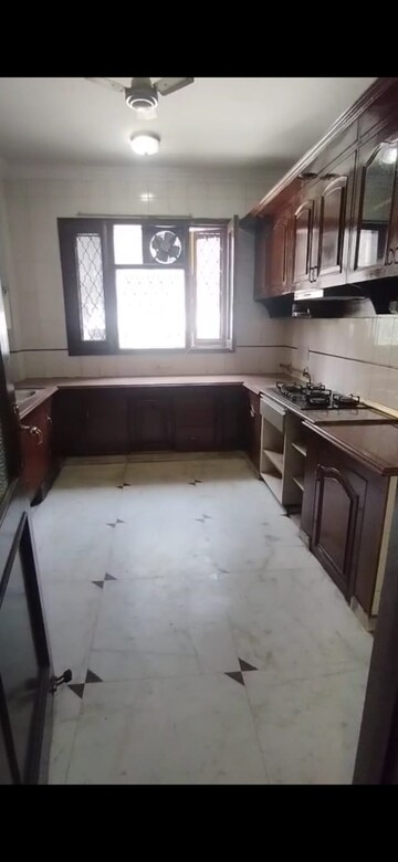Kitchen in 4 BHK Apartment at Sarvodaya Enclave – for Rent