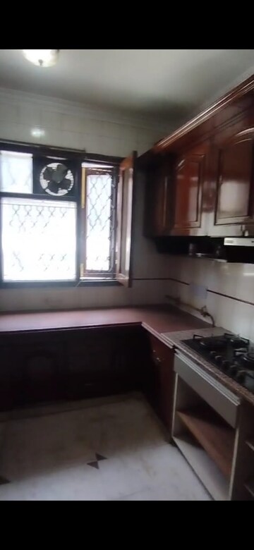 Kitchen in 4 BHK Apartment at Sarvodaya Enclave – for Rent