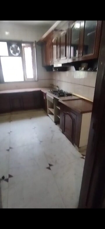 Kitchen in 4 BHK Apartment at Sarvodaya Enclave – for Rent
