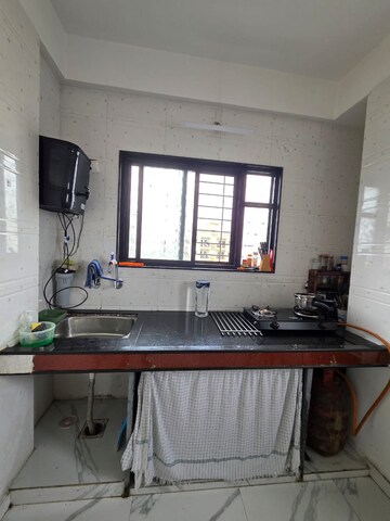 Kitchen in 1 BHK Apartment at Swami Samartha Complex, Wadgaon Sheri – for Rent
