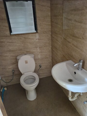 Bathroom in 2 BHK Apartment at Kumar Palaash A, Wadgaon Sheri – for Rent