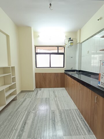 Kitchen in 2 BHK Apartment at Happy Valley, Manpada – for Rent