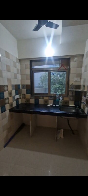 Kitchen in 1 BHK Apartment at Bindra Sateri Legacy, Andheri East – for Rent
