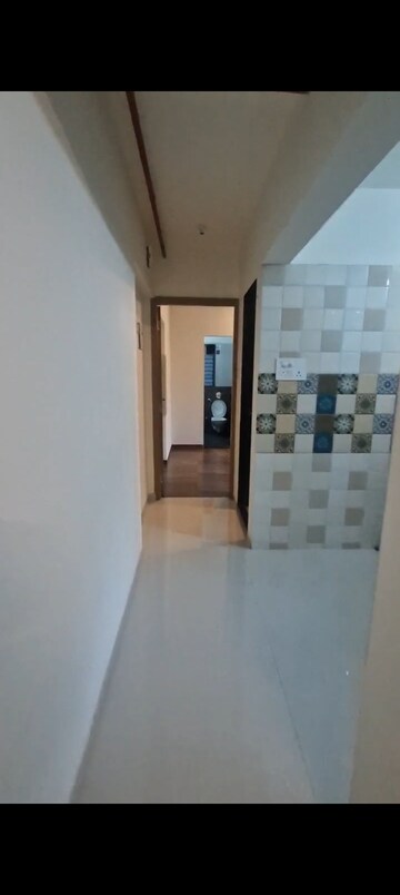 Building Lobby in 1 BHK Apartment at Bindra Sateri Legacy, Andheri East – for Rent