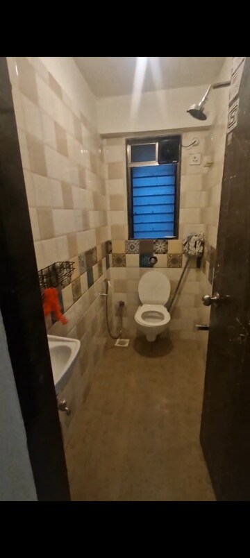 Bathroom in 1 BHK Apartment at Bindra Sateri Legacy, Andheri East – for Rent