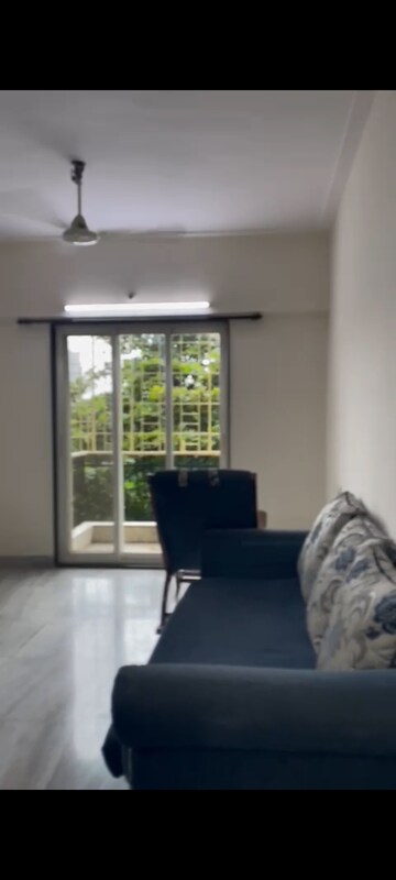 Living Room in 2 BHK Apartment at Raheja Garden Estate Kokanipada, Kokanipada – for Sale