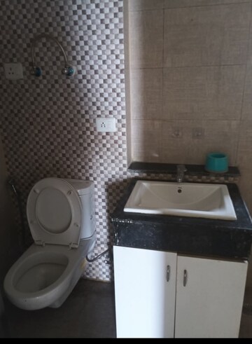 Bathroom in 2 BHK Apartment at Shri Radha Sky Gardens, Sector 16b Greater Noida – for Rent