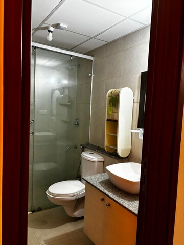 Bathroom in 3 BHK Apartment at Bhartiya Nikoo Homes Phase 2, Thanisandra Main Road – for Rent