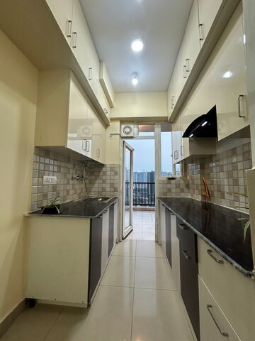 Kitchen in 3 BHK Apartment at Habitech Greens, Tech Zone 4 Greater Noida – for Rent