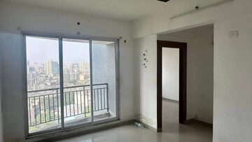 Living Room in 2 BHK Apartment at Tanvi Eminence, Mira Road – for Rent