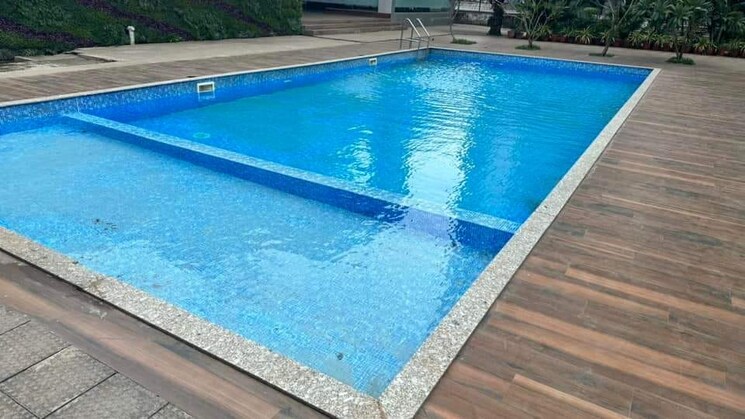 Swimming Pool, tanvi-eminence 2 Bedroom 1017 Sq.Ft. Apartment In Mira Road Thane 9013787