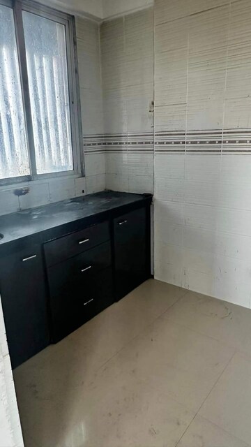 Kitchen in 2 BHK Apartment at Tanvi Eminence, Mira Road – for Rent