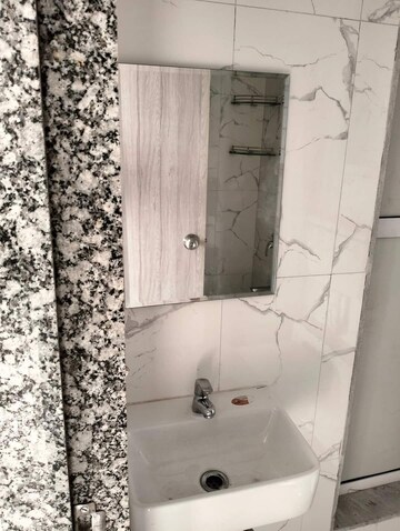 Bathroom in 2 BHK Apartment at Unique Poonam Estate Cluster 2, Mira Road – for Rent