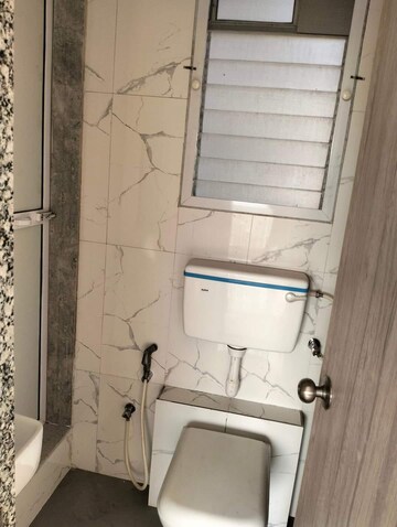 Bathroom in 2 BHK Apartment at Unique Poonam Estate Cluster 2, Mira Road – for Rent