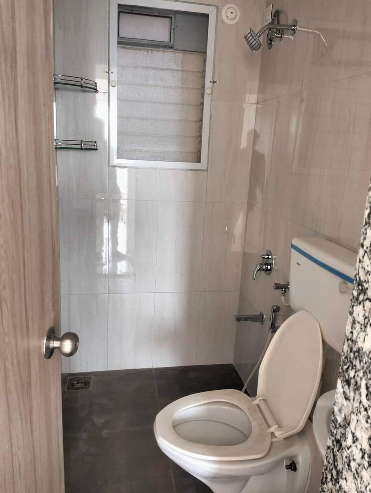 Bathroom, unique-poonam-estate-cluster-2 2 Bedroom 674 Sq.Ft. Apartment In Mira Road Thane 9013835
