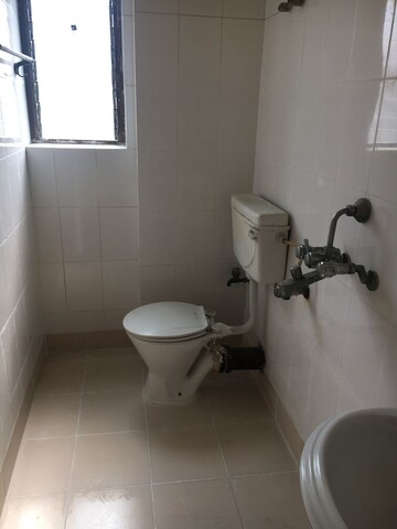 Bathroom in 2 BHK Apartment at Greenfield Heights, New Town – for Rent