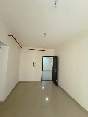 Living Room in 1 BHK Apartment at JP North Imperia, Mira Road – for Rent