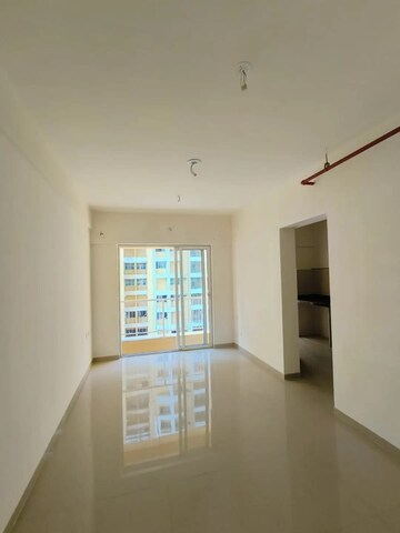 Living Room in 1 BHK Apartment at JP North Imperia, Mira Road – for Rent