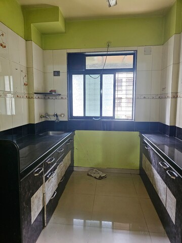 Kitchen in 1 BHK Apartment at Dombivli West – for Sale