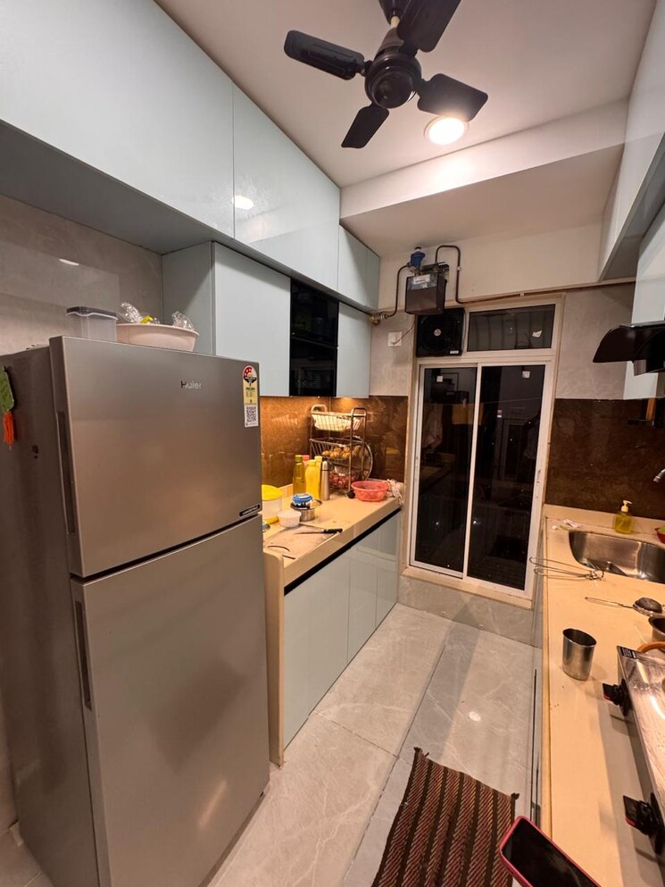 Kitchen, alag-olive 2 Bedroom 691 Sq.Ft. Apartment In Pant Nagar Mumbai 9014123