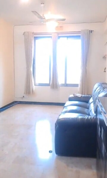 Living Room in 2 BHK Apartment at Hiranandani Estate Hamilton, Patlipada – for Rent