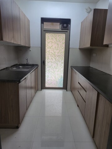 Kitchen in 2 BHK Apartment at Lodha Splendora, Ghodbunder Road – for Rent