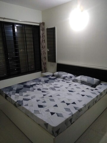 Bedroom in 2 BHK Apartment at Magarpatta Nanded City Sargam, Sinhagad – for Rent