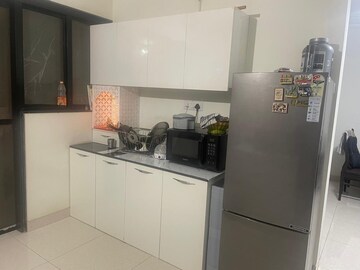 Kitchen in 2 BHK Apartment at Magarpatta Nanded City Sargam, Sinhagad – for Rent