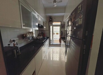 Kitchen in 2 BHK Apartment at Rustomjee Urbania Azziano, Thane West – for Rent
