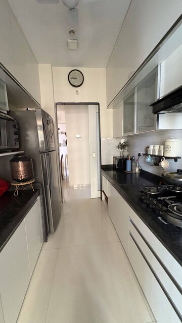 Kitchen in 2 BHK Apartment at Rustomjee Urbania Azziano, Thane West – for Rent
