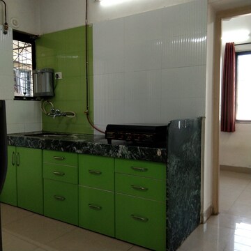 Kitchen in 2 BHK Apartment at Riverview Residency, Sinhagad Road – for Rent