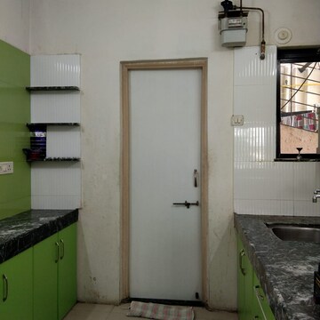 Kitchen in 2 BHK Apartment at Riverview Residency, Sinhagad Road – for Rent