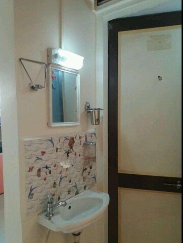 Bathroom in 1 BHK Apartment at Kudale Patil Township, Vadgaon Budruk – for Rent