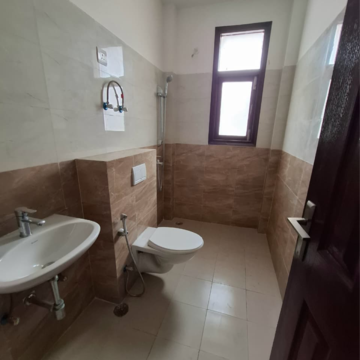 Bathroom in 3.5 BHK Builder Floor at Wave Floors Premium, Wave City – for Rent