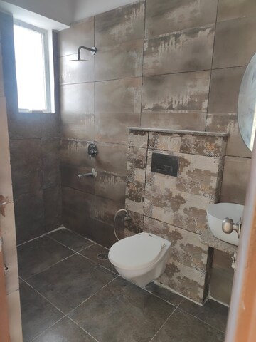Bathroom in 3 BHK Apartment at Dhakoli – for Sale