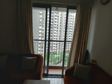 Living Room in 2 BHK Apartment at Runwal Eirene, Balkum Pada – for Sale