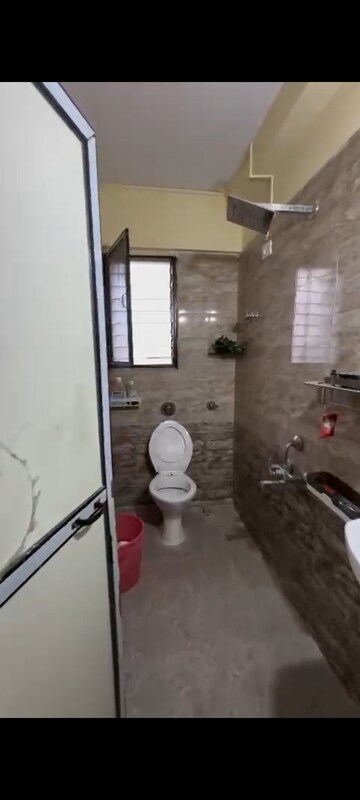 Bathroom in 1 BHK Apartment at Triveni CHS Malad West, Malad West – for Rent