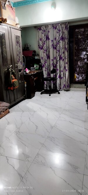 Living Room in 2 BHK Apartment at Rekhi Sai Tulip, Ghansoli – for Sale