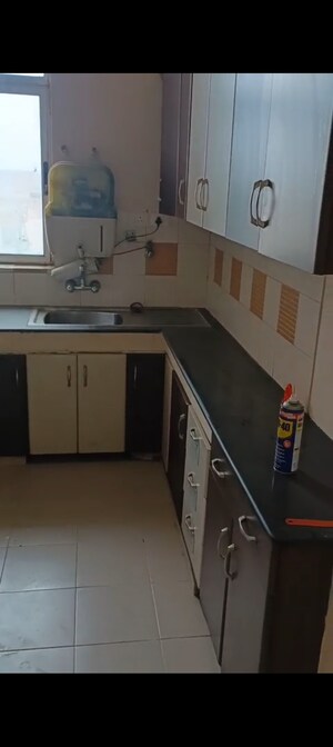 Kitchen in 3 BHK Apartment at Ashiana Palm Court, Raj Nagar Extension – for Sale