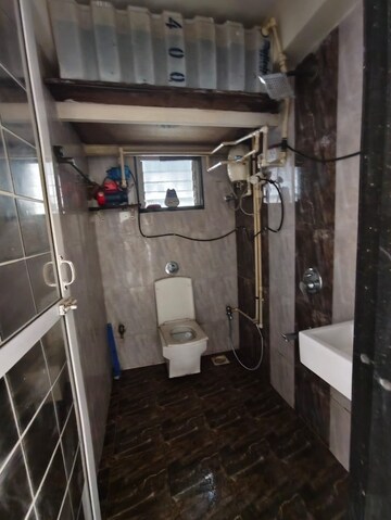 Bathroom in 1 BHK Apartment at Lotus Lotus Link Square, Malad West – for Rent