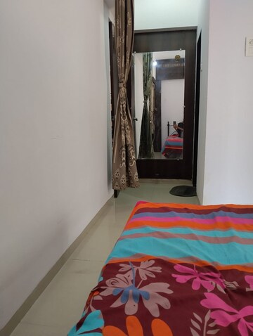 Bedroom in 1.5 BHK Apartment at Shree Satya Shankar Residency, Manpada – for Rent