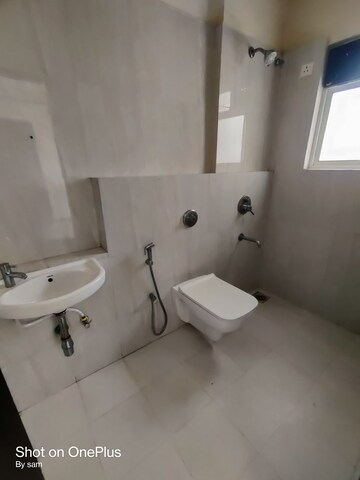 Bathroom in 1 BHK Apartment at Puranik Hometown, Ghodbunder Road – for Rent