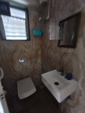 Bathroom in 1 BHK Apartment at Lotus Lotus Link Square, Malad West – for Rent