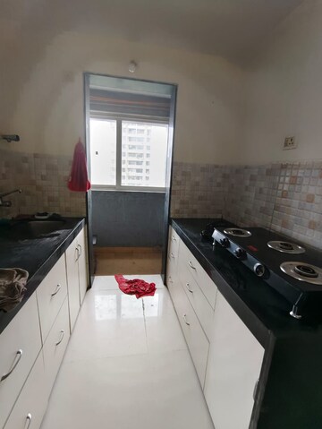 Kitchen in 1 BHK Apartment at Lotus Lotus Link Square, Malad West – for Rent