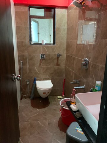 Bathroom in 2 BHK Apartment at Umiya Oasis, Mira Road – for Rent